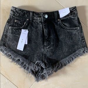 Black denim shorts